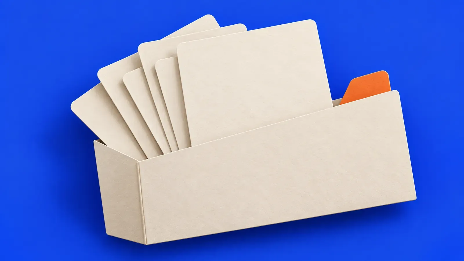 Folder kertas kosong dengan helaian tersusun longgar dan satu tab jingga, menggambarkan semakan koleksi kertas latihan.